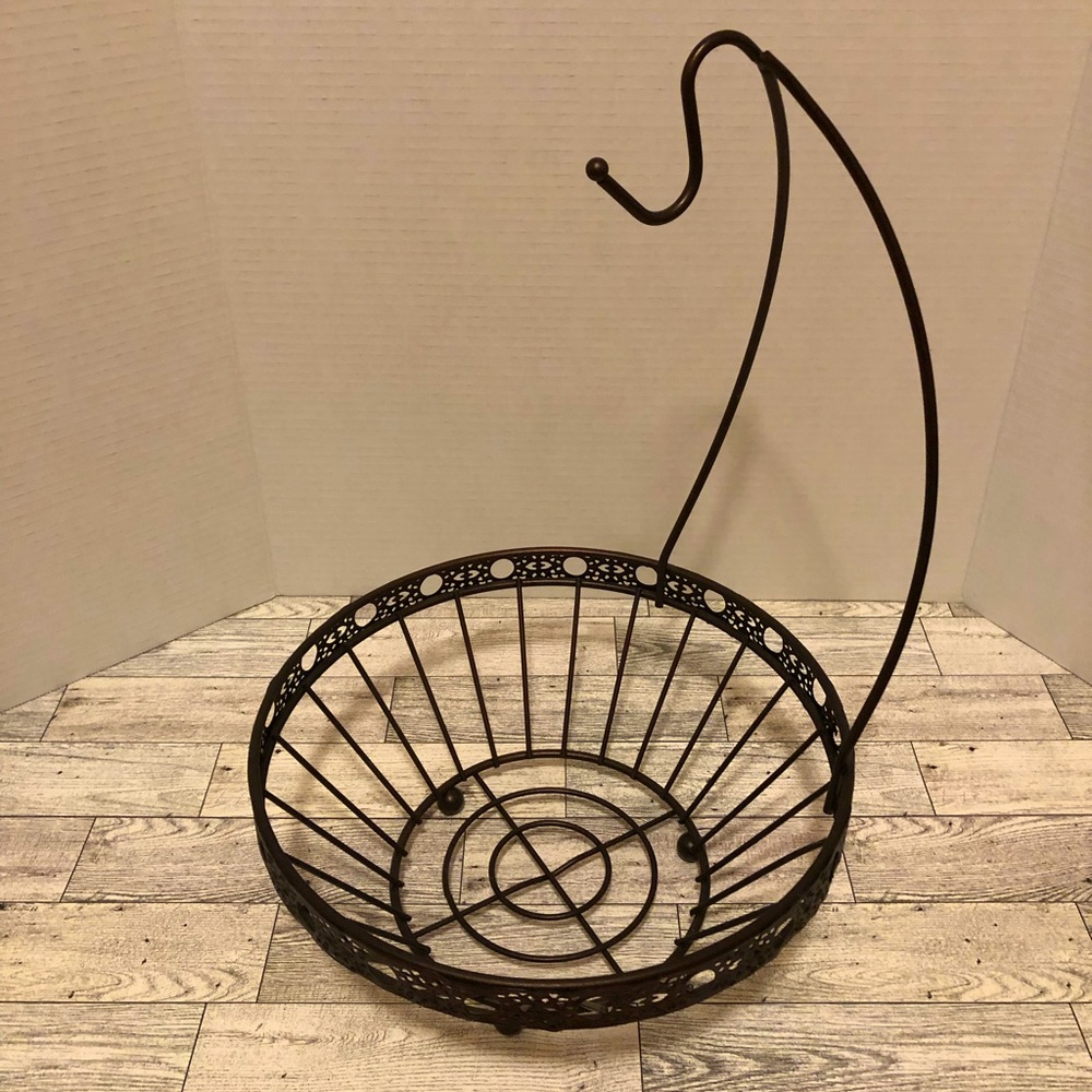 Metal fruit basket (artificial fruit for display only).